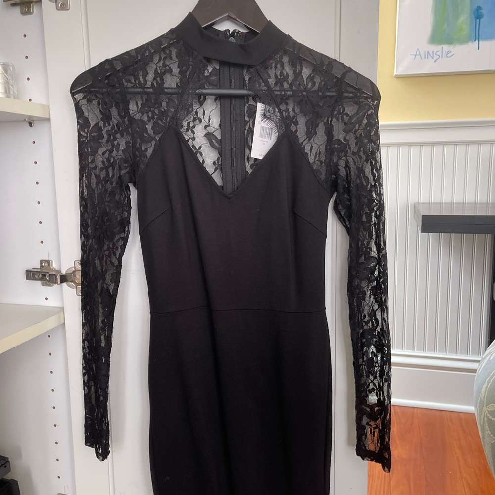 Guess new with tags never worn black mini dress